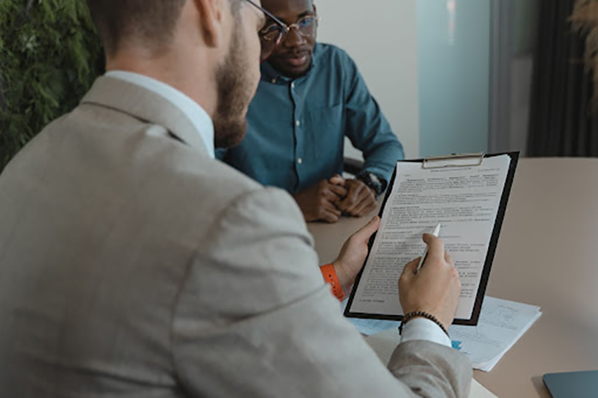 Man Looking At A Legal Document